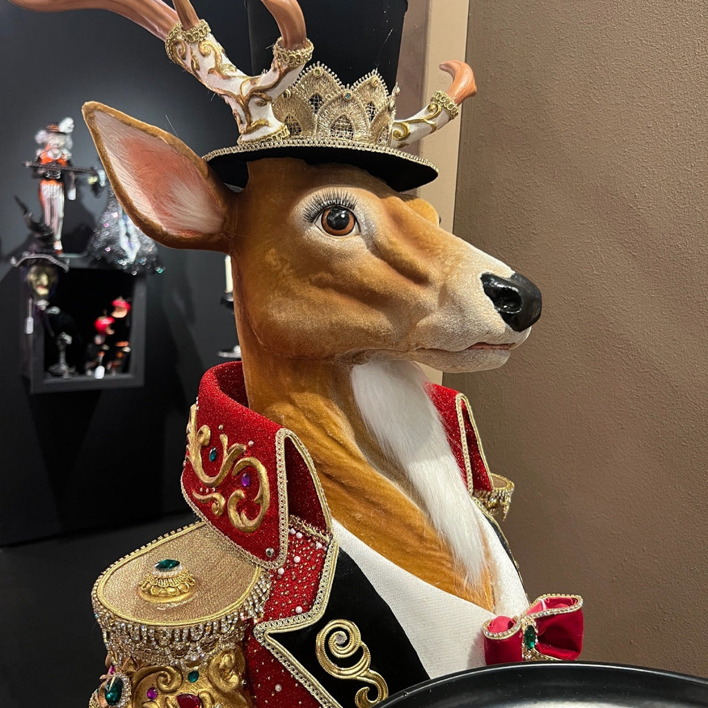 Katherine’s Collection Royal Christmas Ball reindeer butler figure, a designer collectible Christmas decoration in jeweled red and gold attire with crown and top hat.