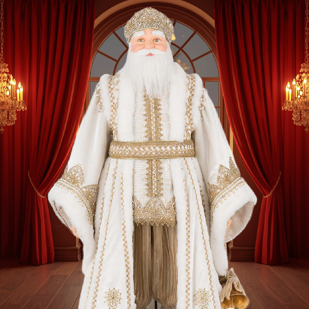 Katherine’s Collection luxury Santa figure in white and gold set against red velvet curtains by Fabulous Fairytales UK