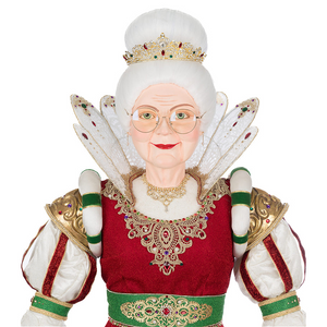 Close-up of Queen Noelle Claus face with glasses, jeweled crown, and hand painted details