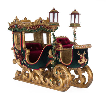 Holiday sleigh with glowing lanterns and rich velvet upholstery