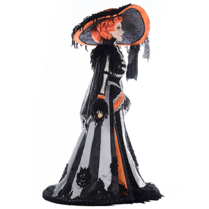 Mrs. Macabre Halloween figure in black and white velvet gown with orange satin overskirt