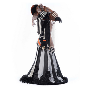 Luxury Halloween display doll wearing wide-brim hat and spiderweb cape with rhinestones
